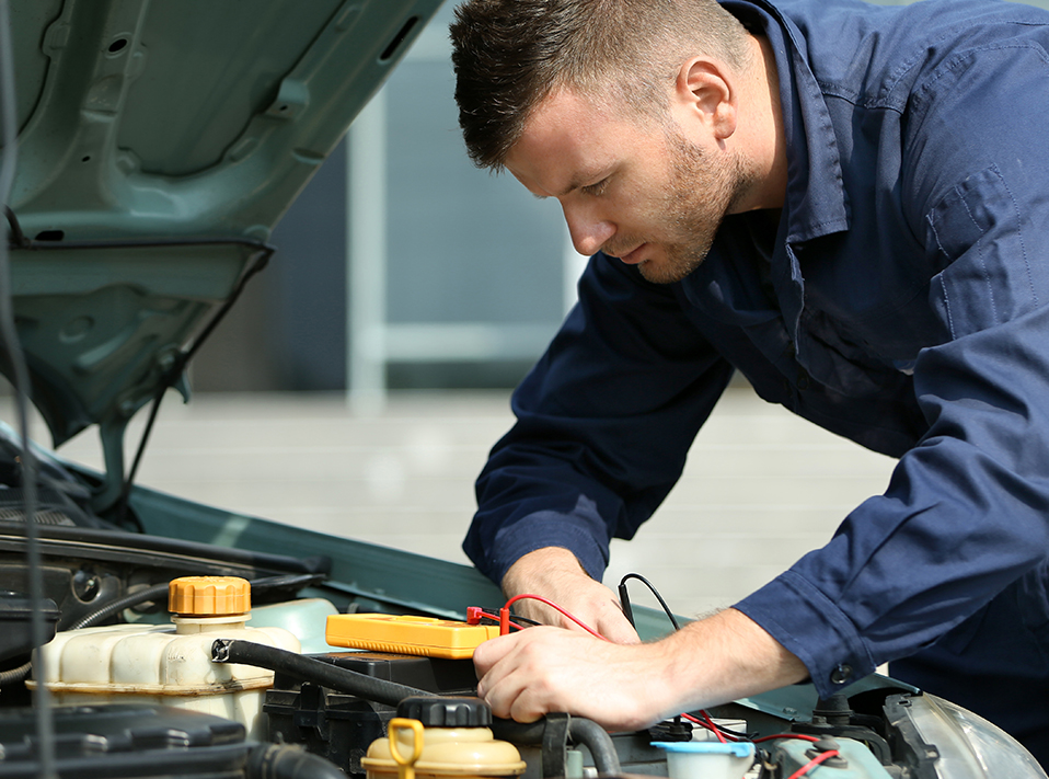 Mechanic servicing a vehicle - Skoda Servicing Slough